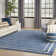 Lucretia Abstract Machine Woven Chenille Indoor/Outdoor Area Rug in Blue