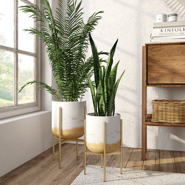 https://assets.wfcdn.com/im/03333001/resize-h755-w755%5Ecompr-r85/1349/134986984/Paloma+Round+Metal+Modern+Indoor+Pot+Planters+Set.jpg