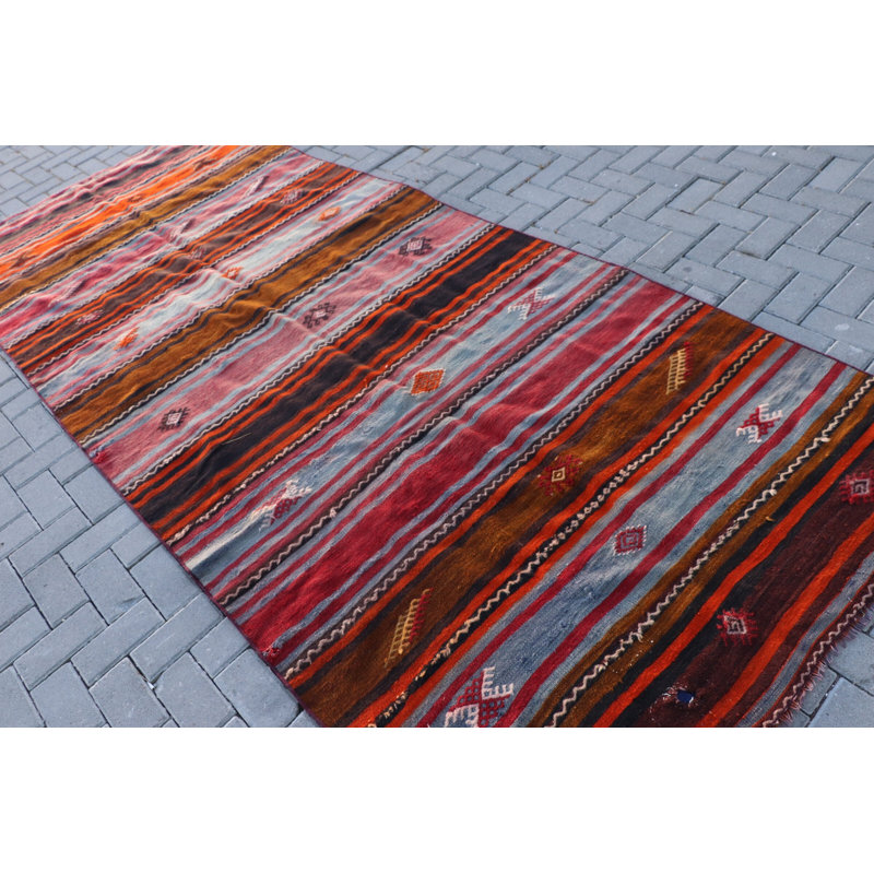 Tapis turc rétro vintage tissé à la main en rayures orange et brunes, idéal pour un décor bohème comme tapis de sol rustique