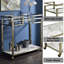 Chariot de service en verre transparent, plateau en faux marbre et laiton