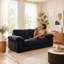 Canapé compact 2 places en velours avec rangement dissimulé, idéal pour les petits appartements et les studios.