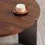 Table basse d'apparence ronde en noyer - Pieds en métal noir, base en bois massif robuste et simple