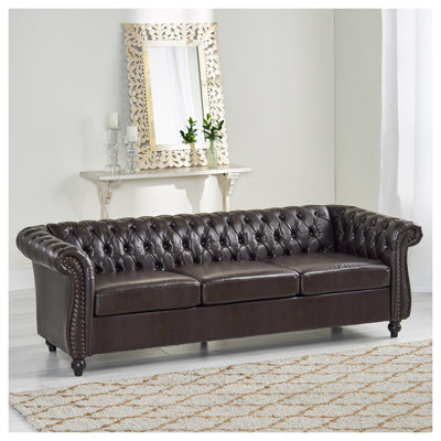 Canapé Chesterfield classique avec capitonnage à boutons profonds, garniture cloutée et accoudoirs roulés - Canapé 3 places en similicuir brun pour le salon