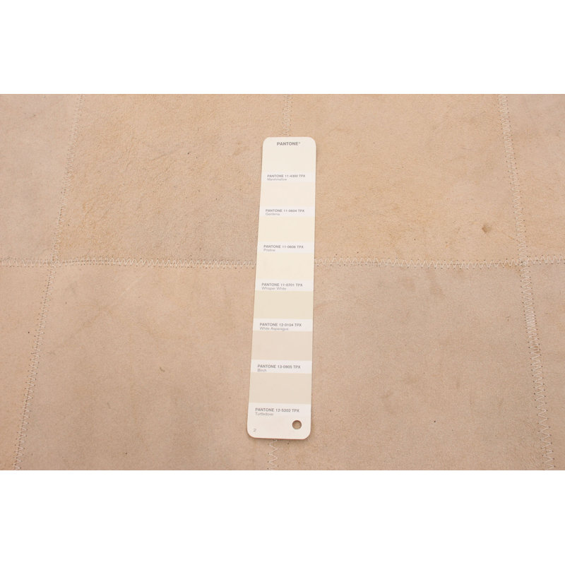 Tapis décoratif en cuir beige fabriqué à la main géométrique