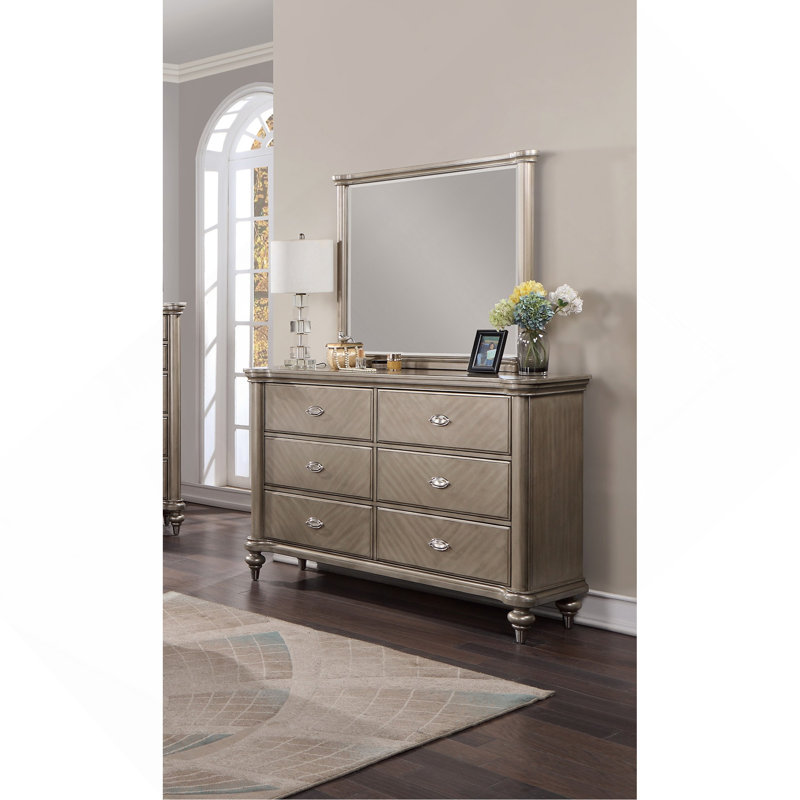 Commode de luxe avec finition argentée et champagne