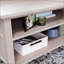 Table basse à plateau relevable avec surface spacieuse et rangement caché, parfaite pour le travail et les loisirs dans les maisons modernes