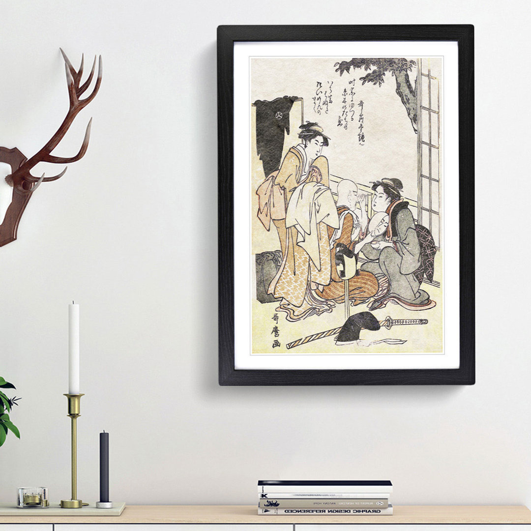 Dressing the Actor by Kitagawa Utamaro - Framed Print