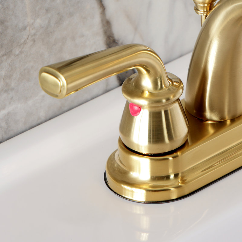 Kingston Brass Restoration Two-Handle 3-Hole Deck Mount 4" Centerset Bathroom Faucet with Plastic Pop-Up, Brushed Brass