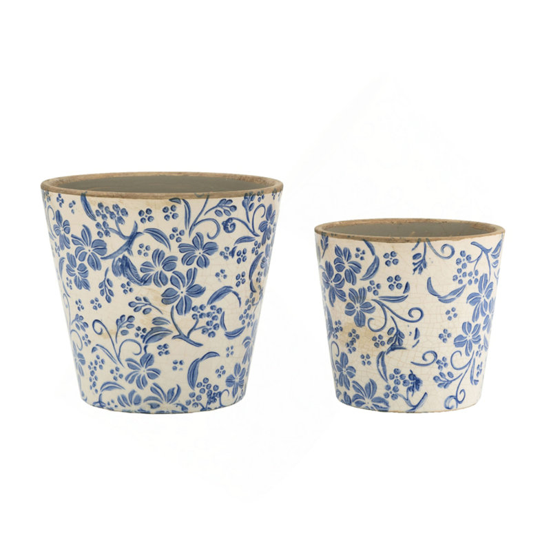 S / 2 jardinières en céramique bleue et blanche à motif floral