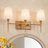 Lidia 3 - Light Dimmable Amber Gold Vanity Light with Off-White Shades Accents