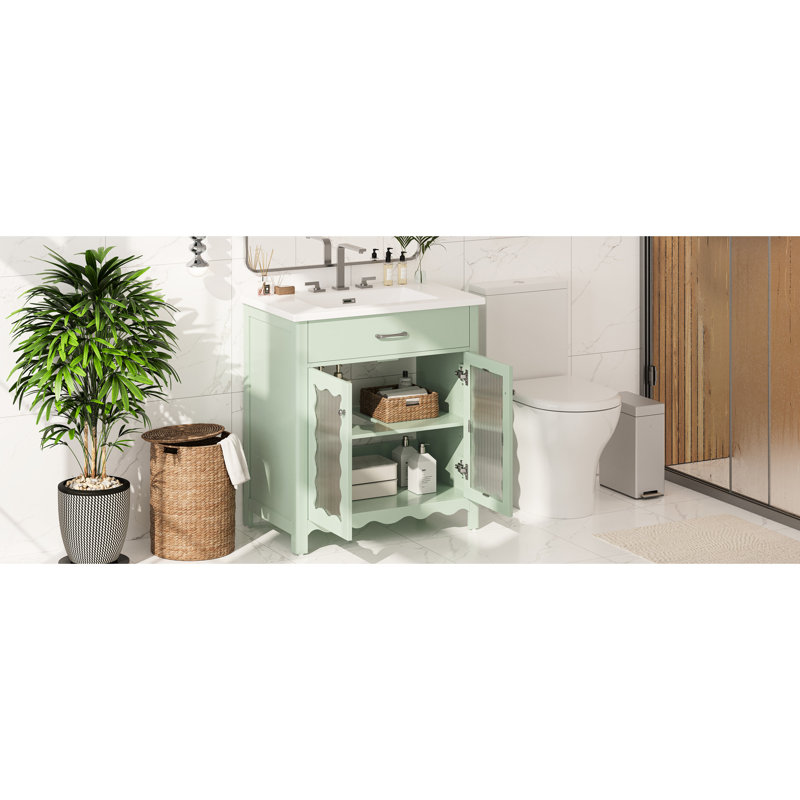 Meuble-lavabo de 79 cm avec lavabo rectangulaire en céramique, grand espace de rangement, rayures verticales et poignées argentées pour un design moderne et élégant. Profil incurvé, esthétique accueillante.