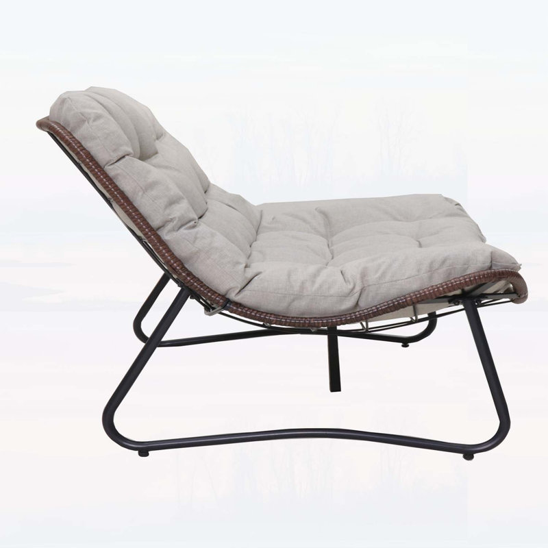 Canapé de patio avec osier résistant aux intempéries, coussins épais et structure en métal durable pour un confort et un style extérieurs