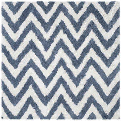 Tapis ivoire / bleu touffeté à la main Delane