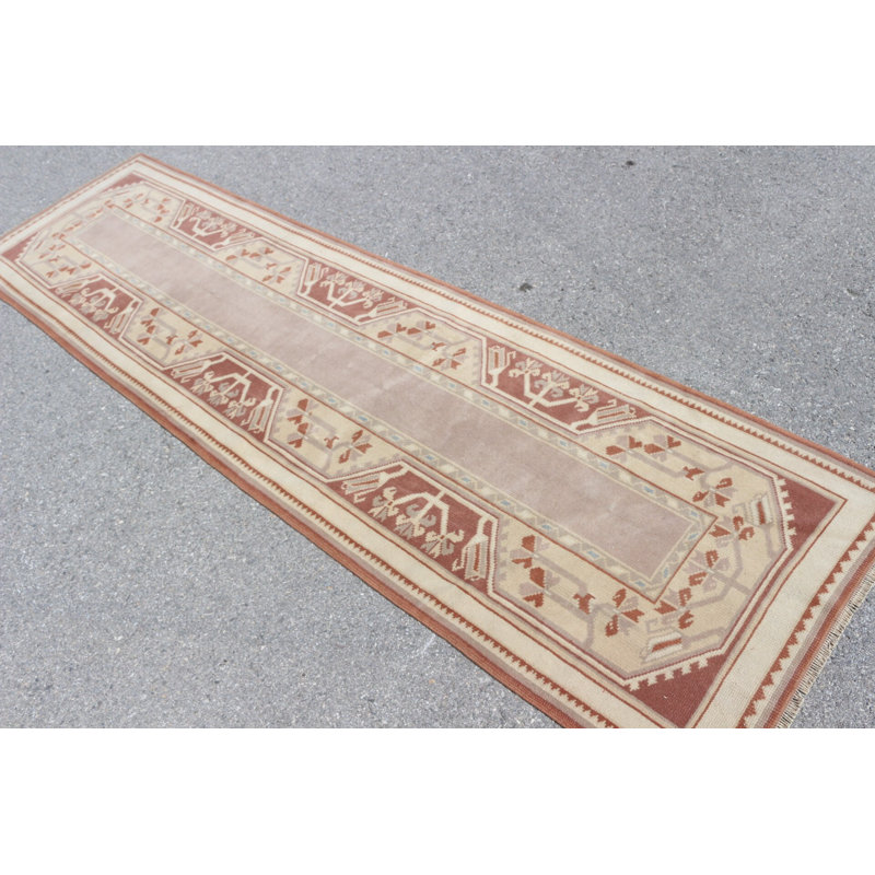 Tapis turc antique beige pour couloir et escalier en matériaux biologiques