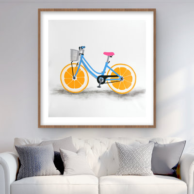Orange Wheel Bike - reproduction encadrée avec passe-partout pour la décoration intérieure