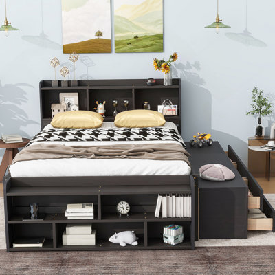 Lit pratique avec bibliothèque latérale multifonctionnelle et tiroirs à roulettes lisses pour un espace de chambre à coucher propre et relaxant