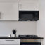 Urban Living 1,7 pi³ Four à micro-ondes à hotte intégrée de 1000 W en noir