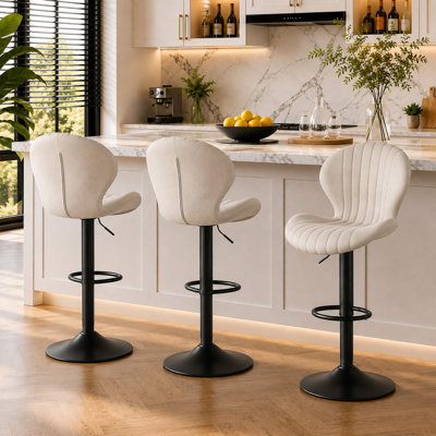 Tabouret de bar pivotant à dossier festonné