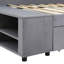 Lit simple tapissier en forme de L avec velours gris et rangement. Tête de lit confortable. Tiroirs spacieux pour les vêtements. Armoire latérale supplémentaire