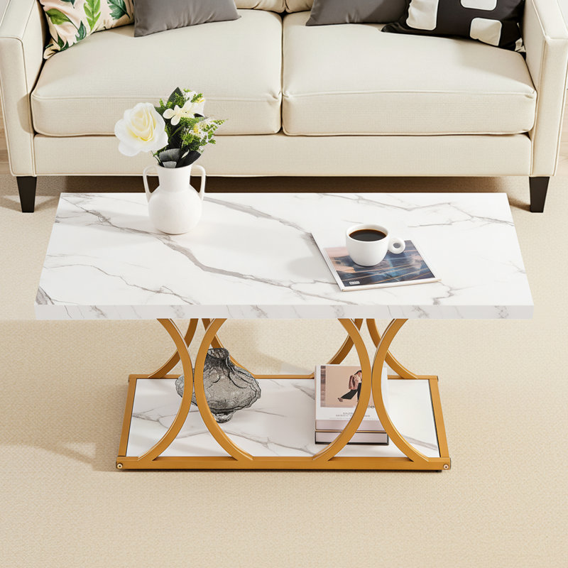 Table basse rectangulaire à deux niveaux avec pattes géométriques, style moderne effet marbre, structure métallique robuste et minimaliste, idéale pour le salon ou le bureau. Montage facile. Couleur : blanc.