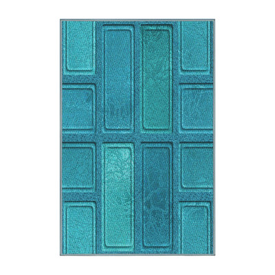 Tapis à motif géométrique turquoise