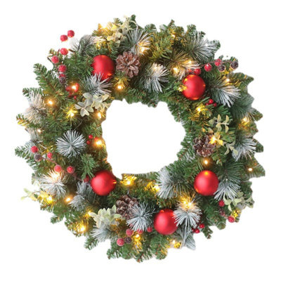 Couronne de Noël artificielle pré-éclairée 16 pouces, couronne de décorations de porte de Noël avec 30 lumières chaudes DEL, boules de Noël, aiguilles de pin et baies rouges pour ornement de Noël de porte d'entrée