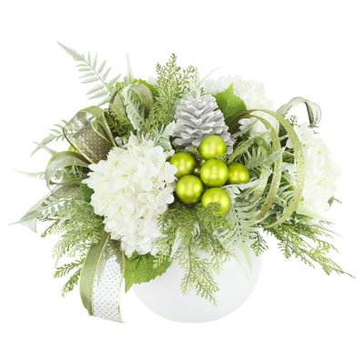 Centre de table des fêtes avec hortensias, ornements et boucles