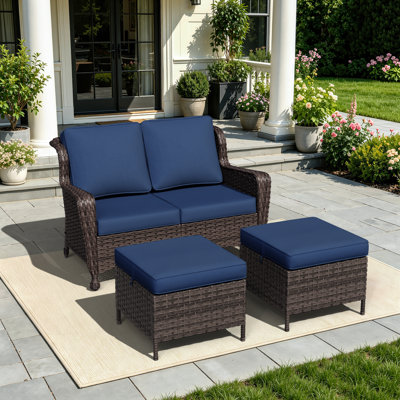 3-Piece Patio PE Wicker Outdoor Conversation Set with Loveseat, 2 Ottomans & Blue Cushions