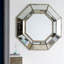 Miroir octogonal surdimensionné argenté