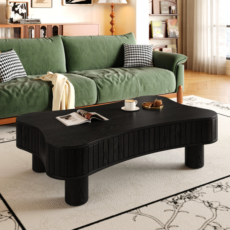 Table basse relevable pour salon, 107 cm (42 pouces), rangement à panneaux cannelés, réglage hydraulique, finition anti-rayures, noire. Conception latérale, zones de rangement dissimulées, levage en douceur, formes arrondies.