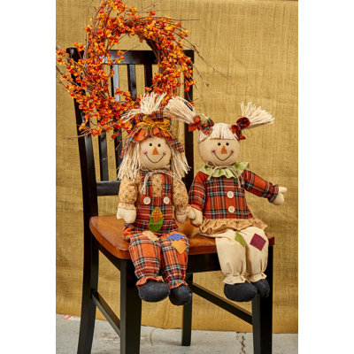 The Holiday Aisle® 24" Harvest Sitting Scarecrow Figurine, Set of 2