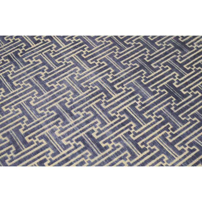 Tapis bleu et ivoire de haute qualité noué à la main