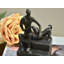 Figurine Dibiase homme caressant un chiot