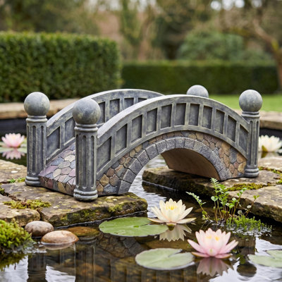 The Halfpence Cobble Stone Bridge Statue