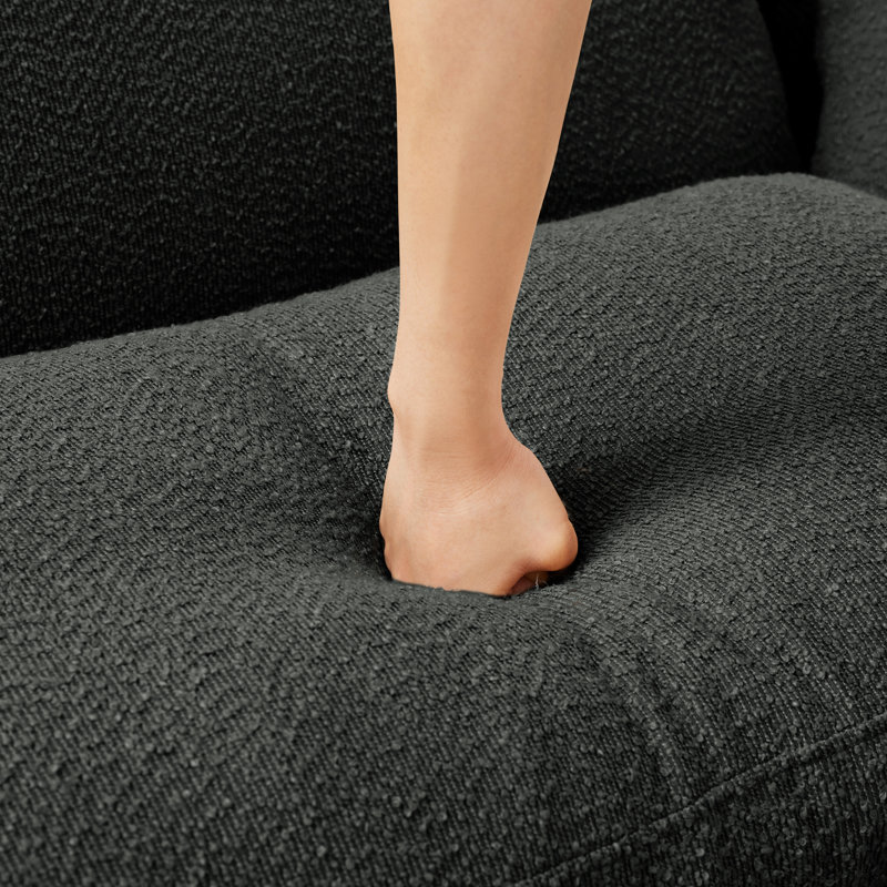 Gris foncé avec un design moderne en forme de boucle, des pieds cylindriques et une fabrication pour la détente dans n'importe quel espace - coussins de siège moelleux, coussins décoratifs courbés, base solide