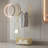 Modern Golden Metal Bracket - Elegant Storage Hanger with Rollers and Storage Baskets