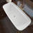 66.9 " L x 30.7 " W Freestanding Soaking Acrylic Bathtub