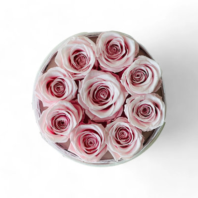 Arrangement floral rose en boîte