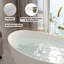 Crestone 67" x 33.5" Freestanding Soaking Solid Surface Resin Stone Bathtub with Black Bath Pollow