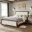 Lit luxueux avec tête de lit en tissu souple et structure en bois durable, parfait pour le confort et le style.