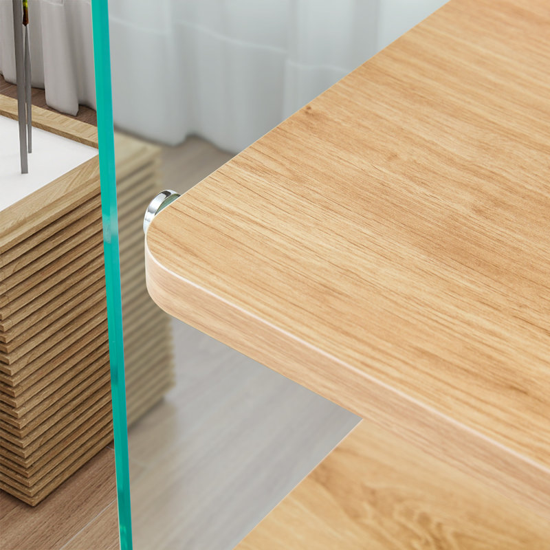 Trois niveaux de tables de chevet. La surface de la planche est en MDF, avec des autocollants, et les deux côtés sont en verre trempé transparent. La conception est simple et généreuse, avec fonction de rangement