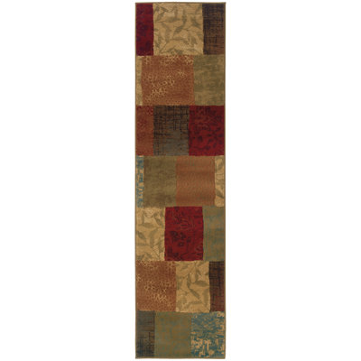 Tapis géométrique vert / rouge Geovany