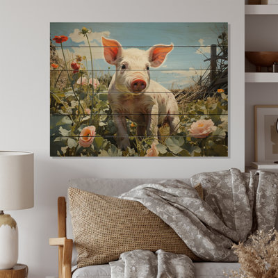 Joli cochon jouant dans des fleurs I sur bois