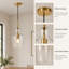Suspension simple à une lumière, abat-jour en verre transparent, cordon réglable, idéal pour îlot de cuisine ou salle à manger.