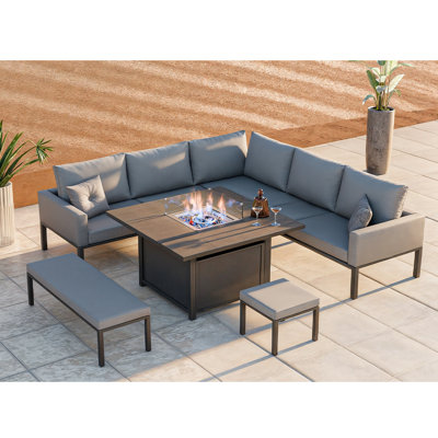 Munisah 8 - Person Patio Dining Set with Rectangular Table , Cushions Included