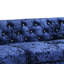 Causeuse en velours bleu
