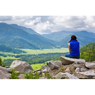 Woman In Mountains - Wrapped Canvas Print