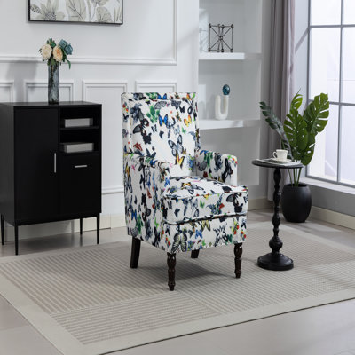Chaise d'appoint rembourrée, fauteuil vintage avec tissu en lin papillon et garniture cloutée pour un salon élégant