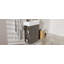 Meuble-lavabo compact autoportant avec lavabo en céramique, parfait pour les petites salles de bain et une utilisation efficace de l'espace