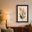 Tableau mural sur toile à fond beige texturé, feuilles orange et brunes-1045155234